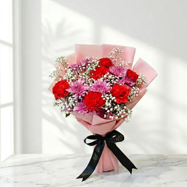 Bouquet of red and pink flowers. fresh flowers same-day delivery 