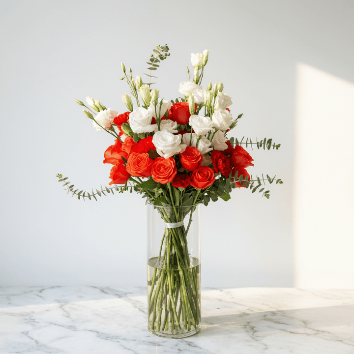 flower bouquet by Atfleurs | floral arrangement | White and red Roses