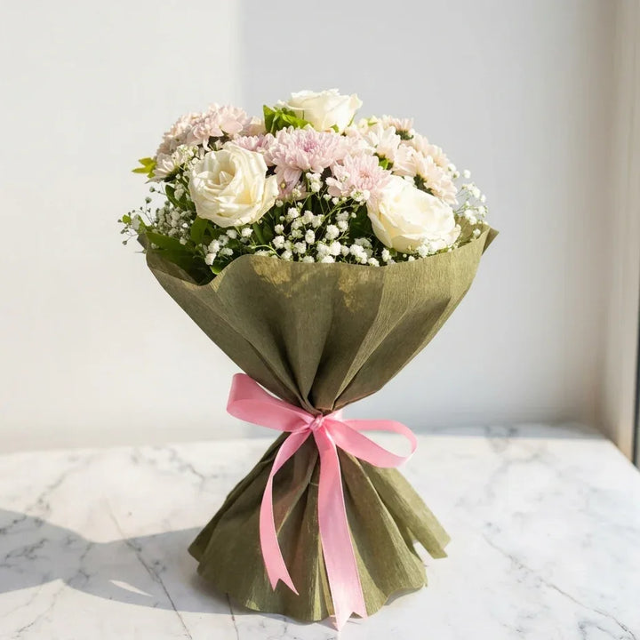 flower bouquet by Atfleurs | floral arrangement | Roses | Hand Bouquet