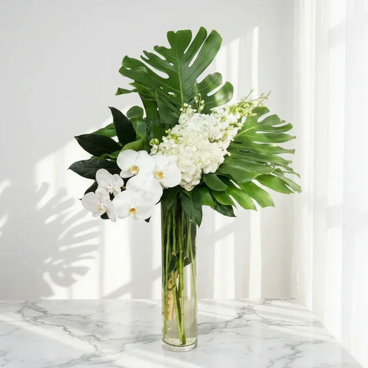 White Orchids Bouquet with Monstera Leaves - atfleurs