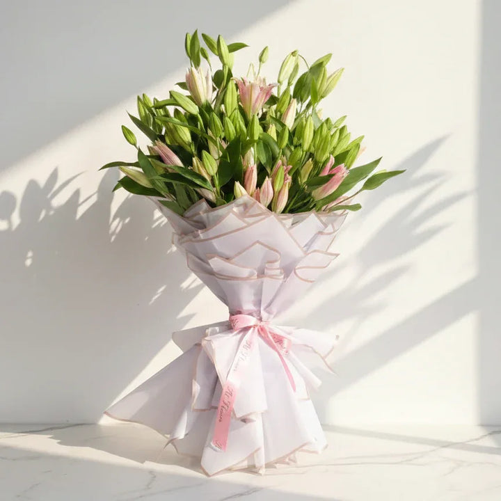 100 Pink Lilies Bouquet with Green Foliage - atfleurs