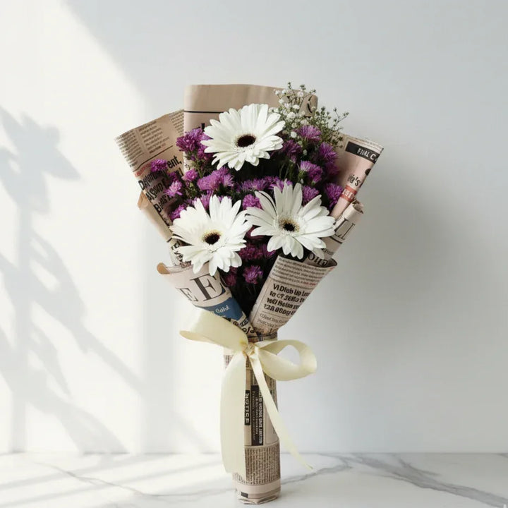 White Gerberas and Purple Button Flowers in Newspaper Wrap - atfleurs