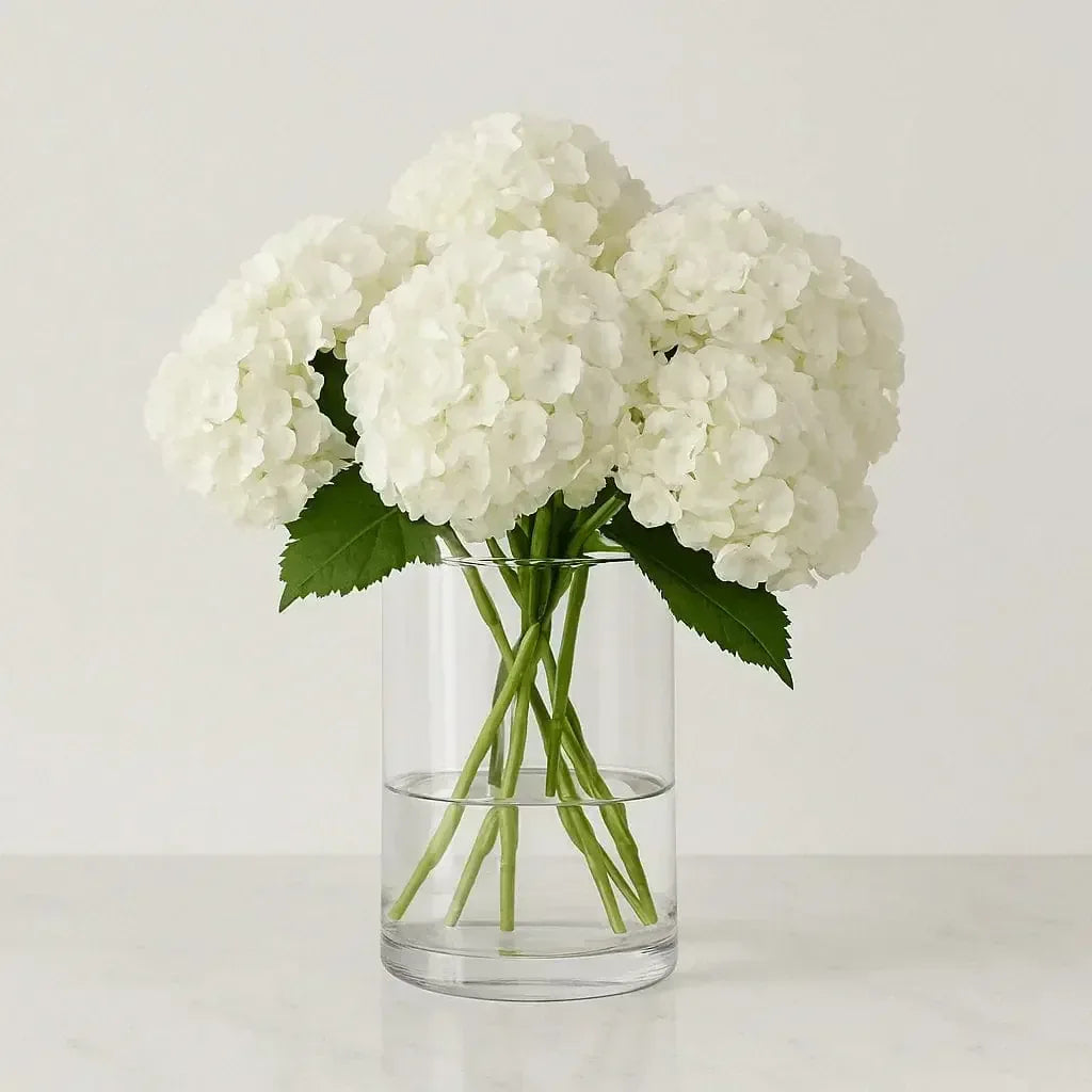 White Hydrangea Stems in Glass Vase - atfleurs