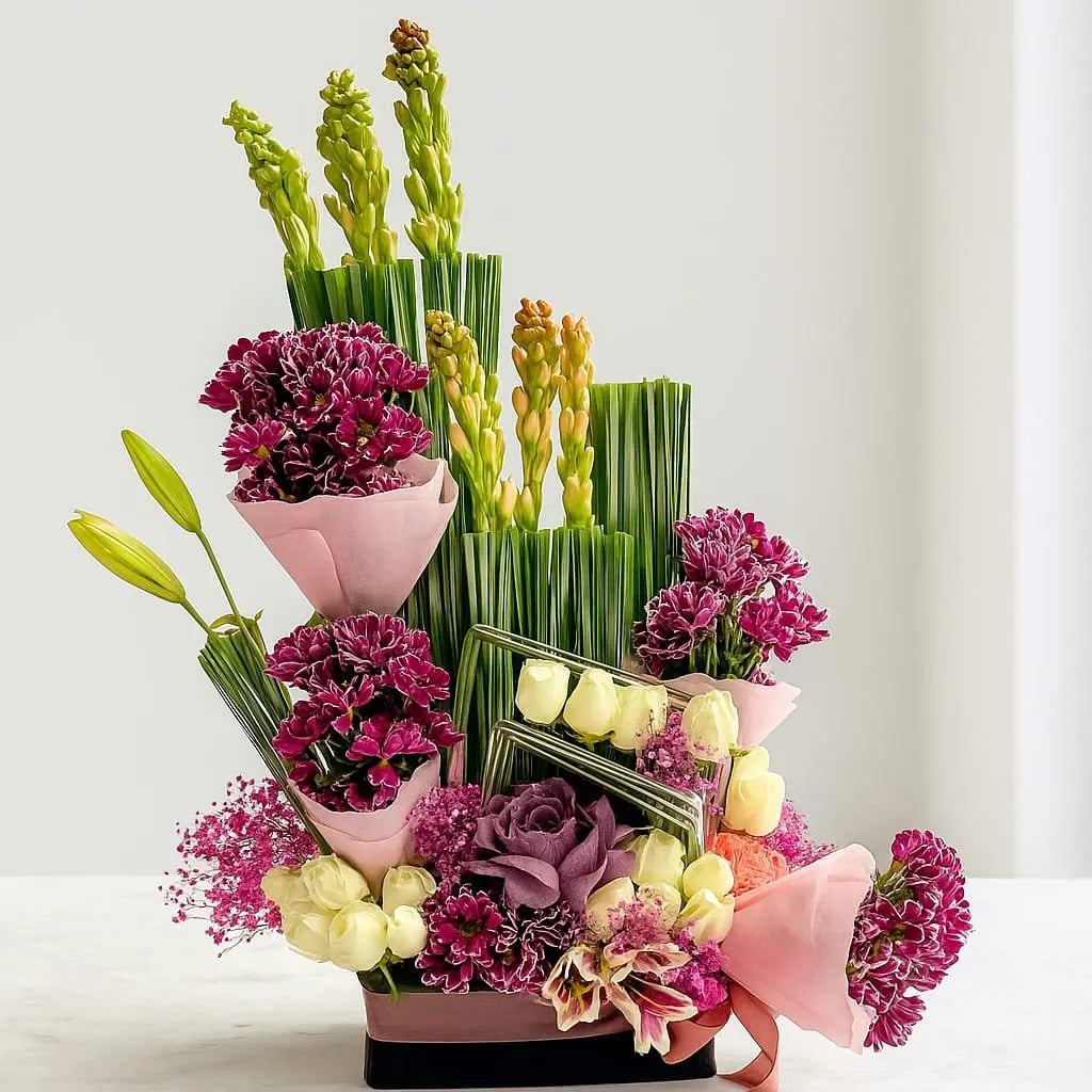 Gypsophila flower arrangement with fresh chrysanthemum rajnigandha cabbage roses