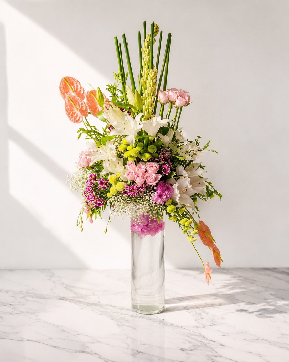 Pink Rose and White Lily Arrangement with Anthuriums in a Vase