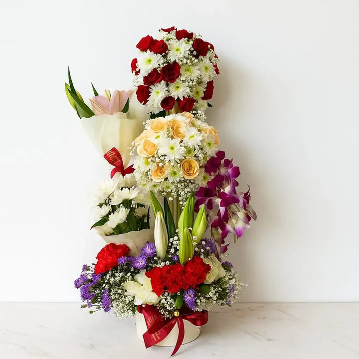 Big Mixed Flower Arrangement with Lilies Roses Orchids and Carnations - atfleurs