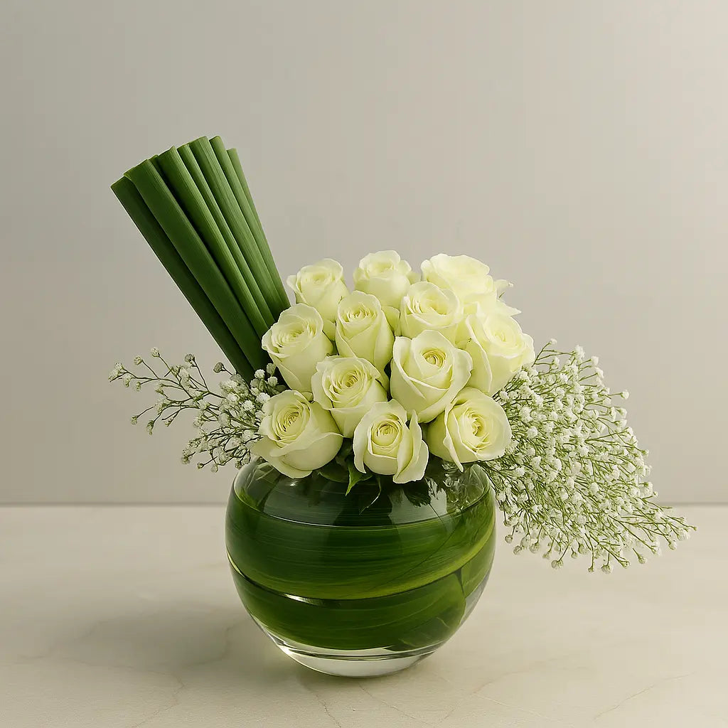 White Rose Bowl with Baby’s Breath atfleurs