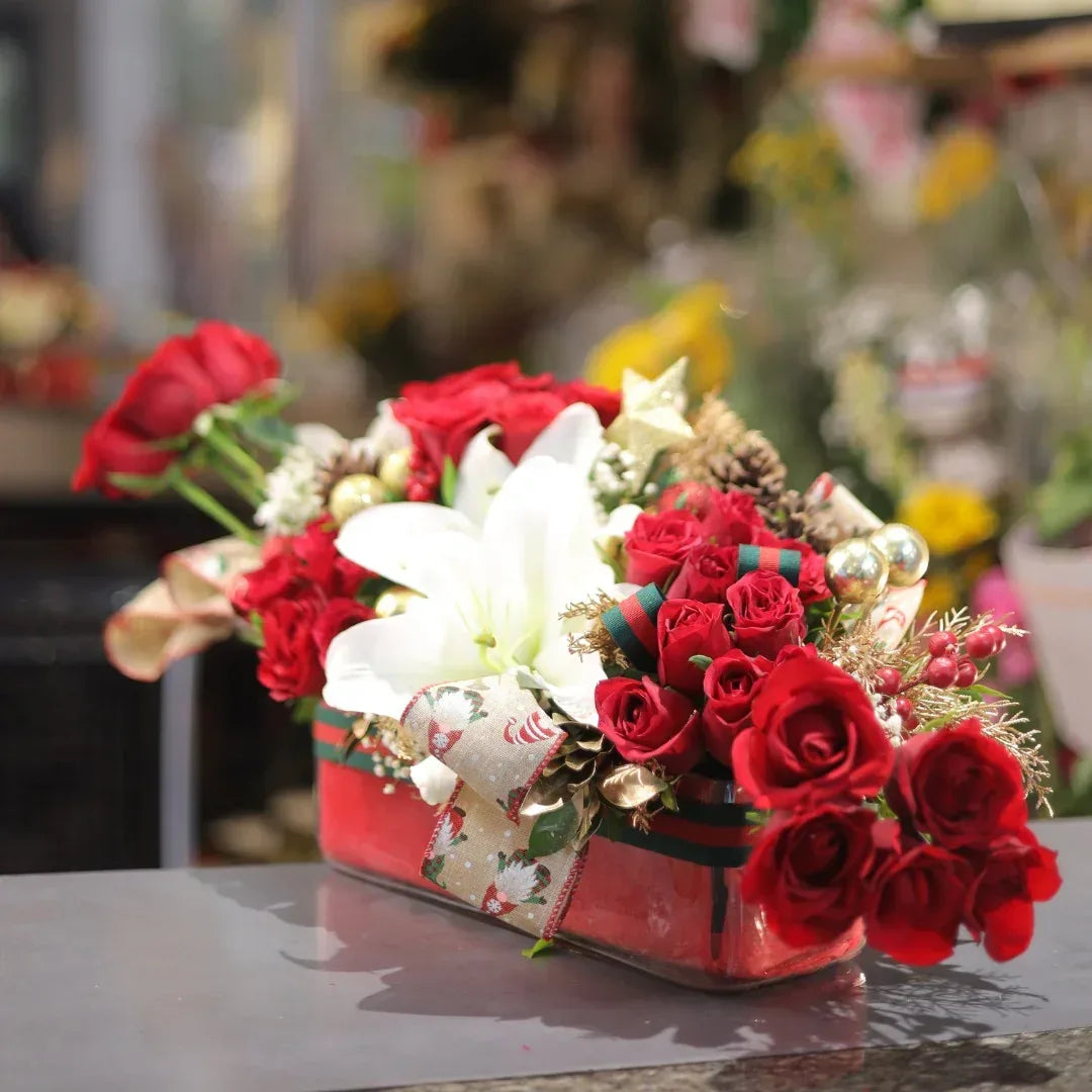 Red Roses and Lilies Flower Box with Christmas Accents - atfleurs