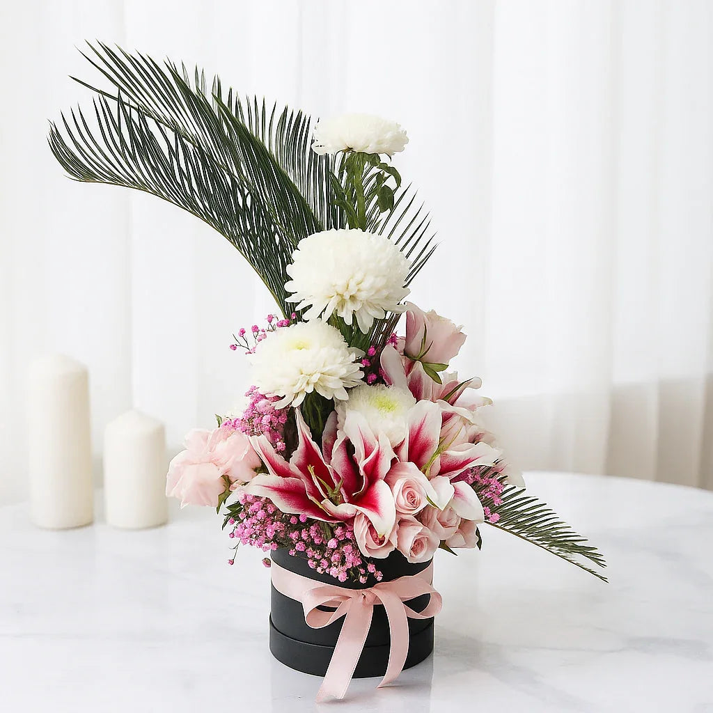 Pink Lilies with Roses and Gypso in a Round Box - atfleurs