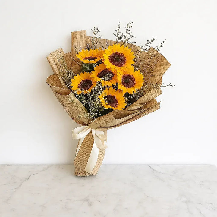 Sunflower Bouquet in Newspaper Wrap - atfleurs