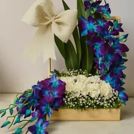 Striking Blue Orchid in Chic White Rose Planter - atfleurs