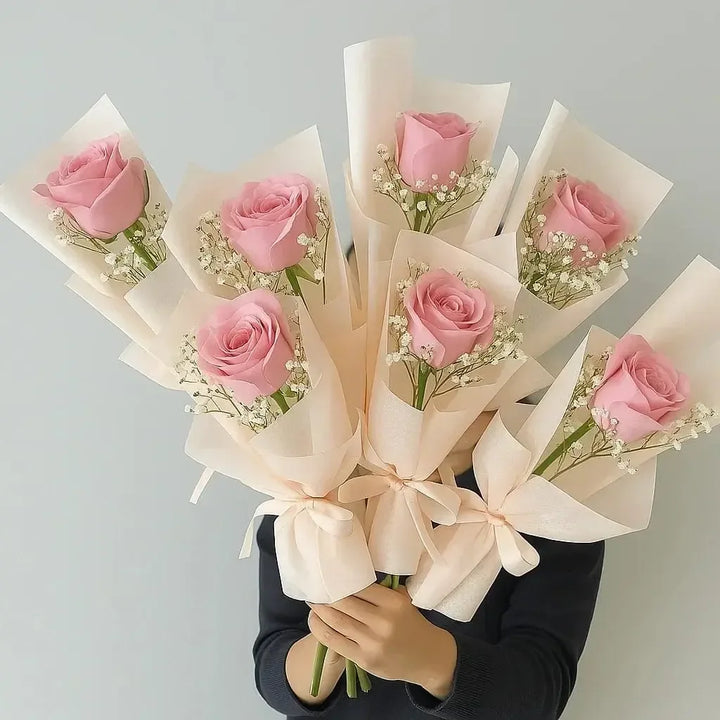 7 Pink Roses in Individual Wraps - atfleurs
