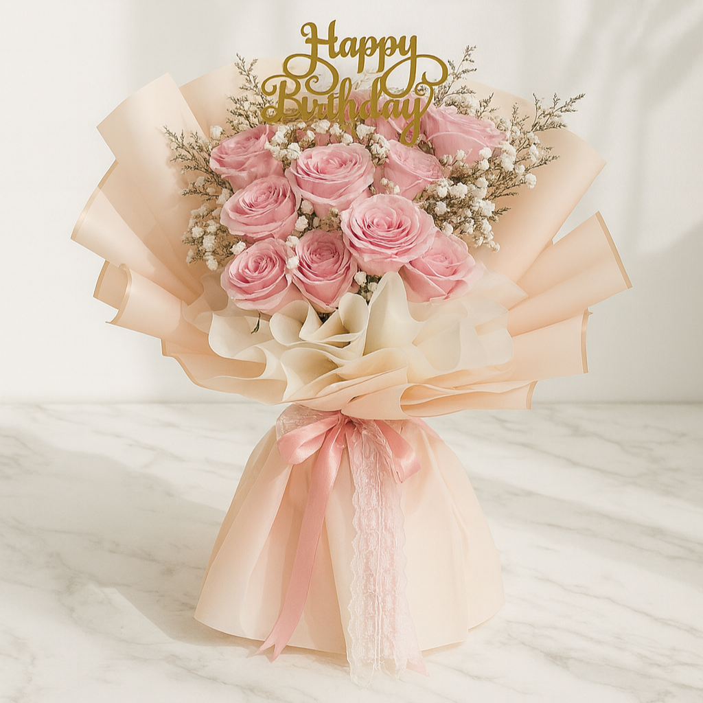 Bouquet of pink roses with a 'Happy Birthday' topper on a white background. Birthday bouquet