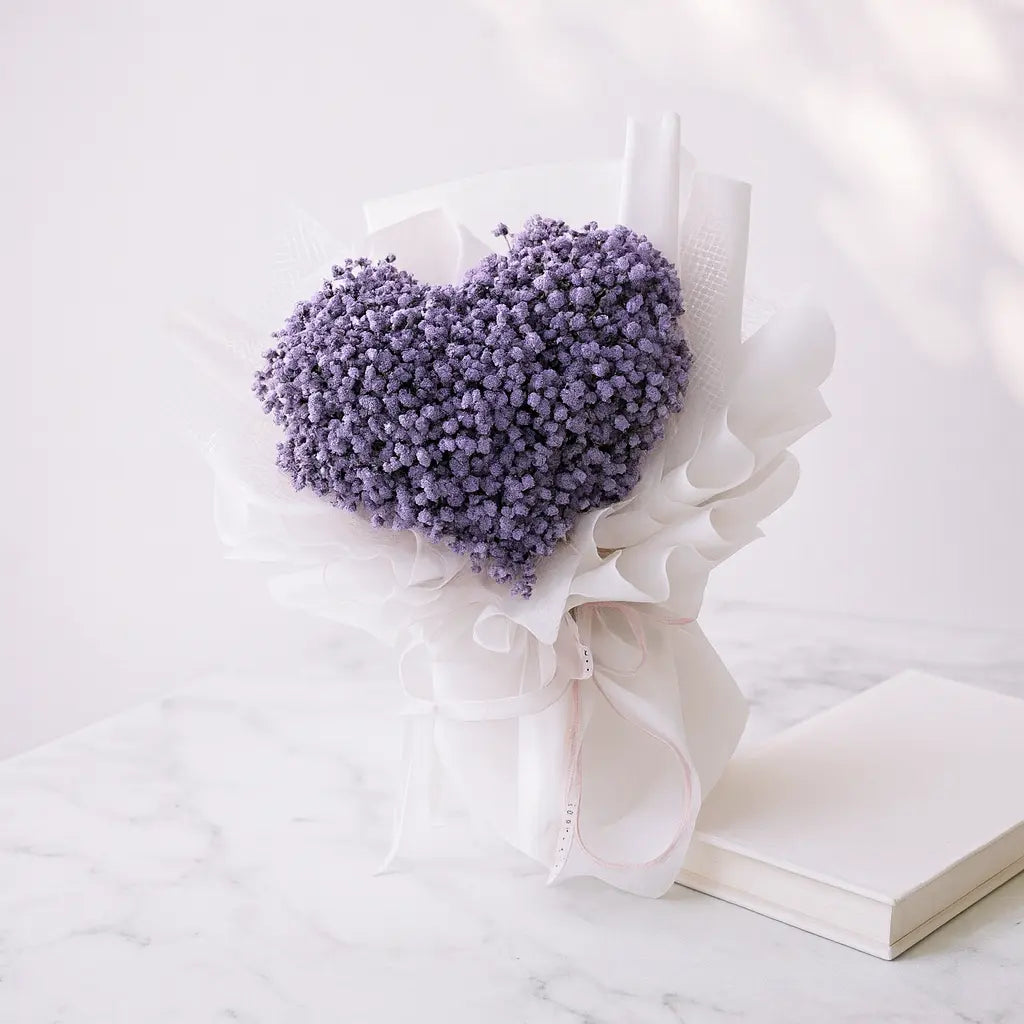 Delicate heart-shaped hand bouquet crafted with fresh gypso flowers, ideal for romantic surprises, anniversaries, or heartfelt gifting. A soft and meaningful floral gesture to express love and affection on special occasions.