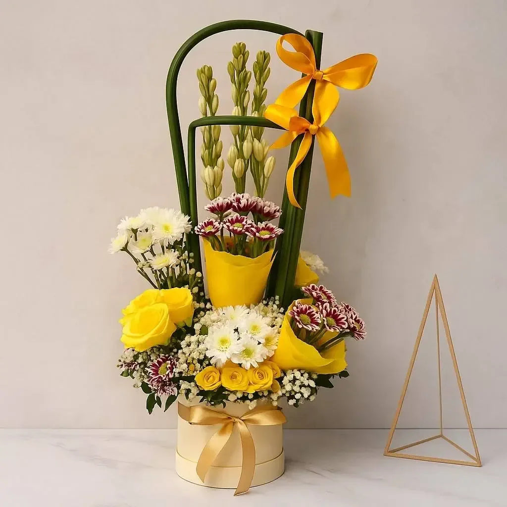 Rajnigandha (Tuberose) and Yellow Rose Box with Carnations and Chrysanthemus - atfleurs