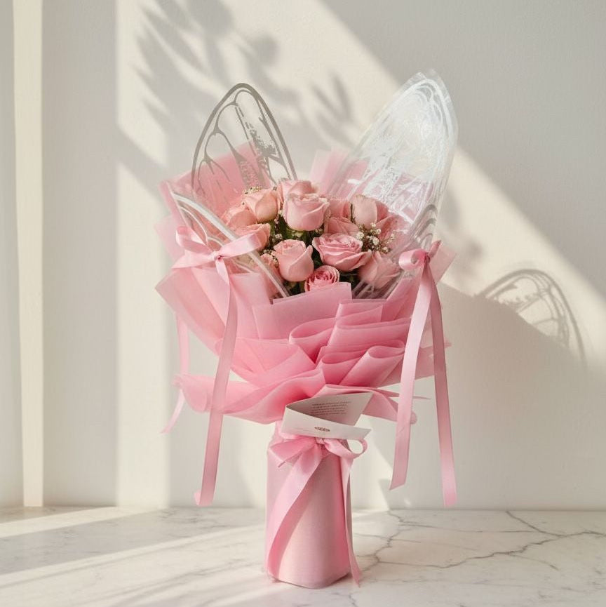 Gypsophila and Butterfly Wrap in a Pink Rose Bouquet